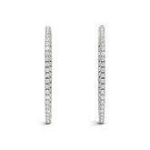 Pair of diamond hoop earrings on a white background