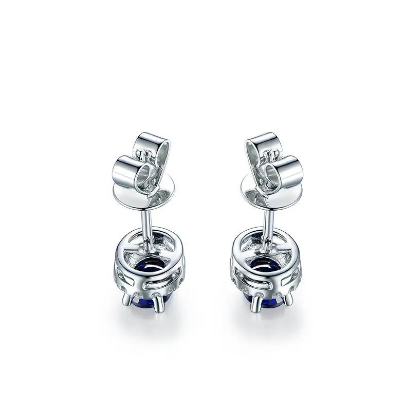 Stud Earrings with Oval Blue Sapphire and Halo