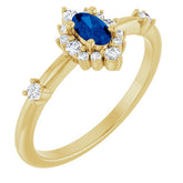 Oval Blue Sapphire Halo Ring with Diamond Accents in Yellow Gold