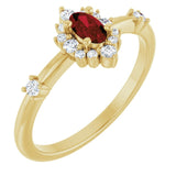 Oval Mozambique Garnet & Diamond Halo Ring in Yellow Gold