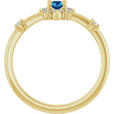 Oval Blue Zircon Halo Ring with Diamond Accents in Yellow Gold