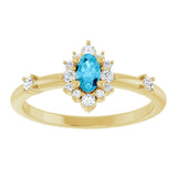 Oval Aquamarine Halo Ring with Diamond Accents in Yellow Gold