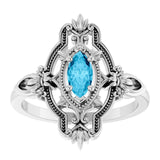 Marquise Aquamarine Solitaire Ring in Gold and Platinum