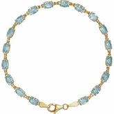 Oval Natural Sky Blue Topaz Line Bracelet In Gold & Platinum