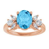 Oval Swiss Blue Topaz & Diamond Accented Ring in Gold and Platinum