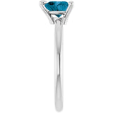 Heart London Blue Topaz Solitaire Ring in Platinum