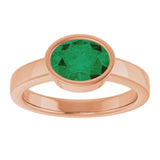 Oval Lab-Grown Emerald Solitaire Ring in Gold and Platinum