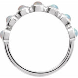 Round White Opal Cabochon Ring in Platinum