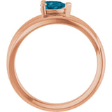 Pear London Blue Topaz Negative Space Ring in Gold