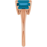 Emerald London Blue Topaz Three Stone Ring in Gold and Platinum