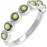 Round Peridot Cabochon Ring in Gold and Platinum
