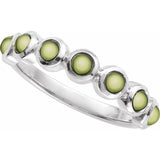 Round Peridot Cabochon Ring in Gold and Platinum