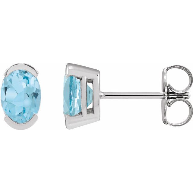 Sky Blue Topaz Oval Solitaire Stud Earrings in Gold and Platinum