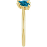 Pear London Blue Topaz Multi Stone Ring in Yellow Gold