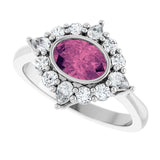 Oval Pink Tourmaline & Diamond Halo Ring in Gold and Platinum