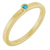 Round Blue Zircon Solitaire Ring in Gold