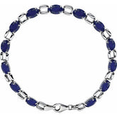 Oval Lab-Grown Blue Sapphire Line Bracelet In Gold & Platinum