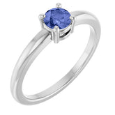 Round Tanzanite Solitaire Ring in Gold and Platinum