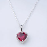 0.90Ct Heart Ruby and Lab Grown Diamond Halo Pendant Necklace in Gold