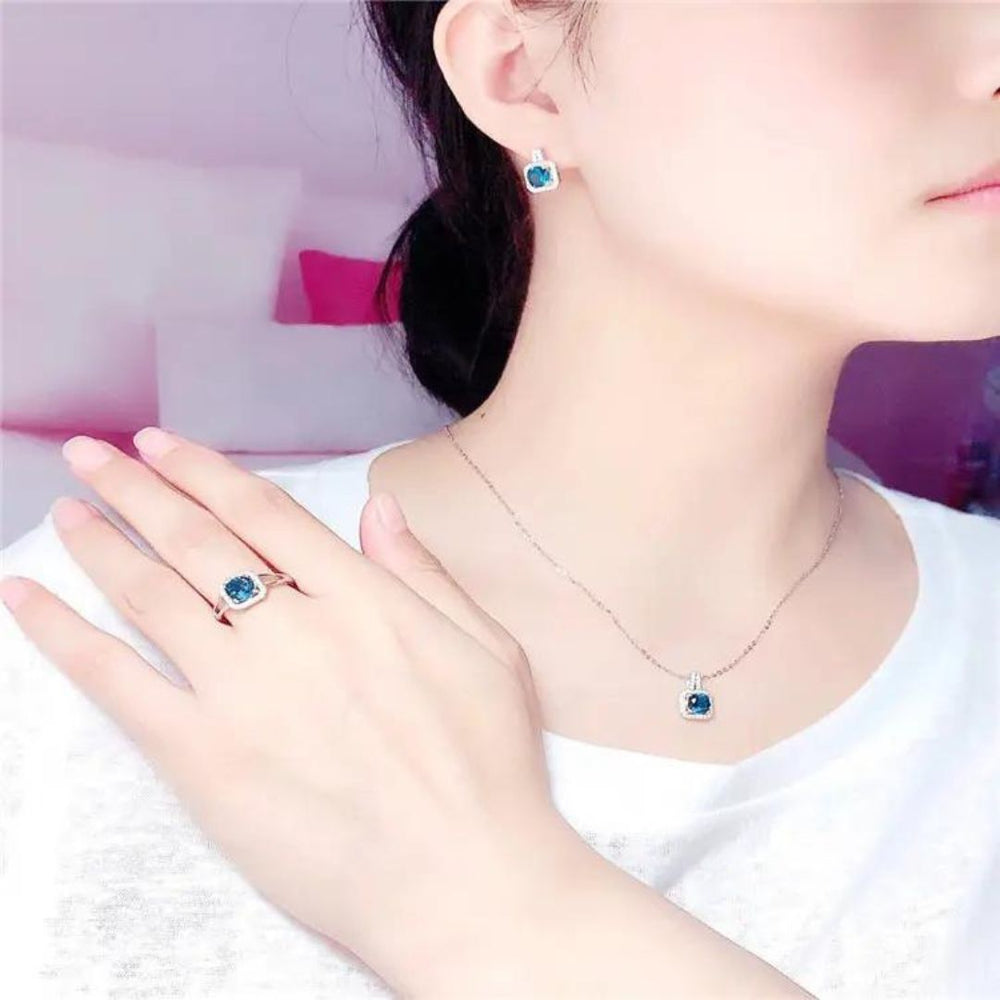 Stud Earrings with Blue Sapphire and Diamond Halo