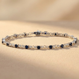 Blue Sapphire and 0.17ct Lab Grown Diamond Claw Set Tennis Bracelet in 925 Sterling Silver