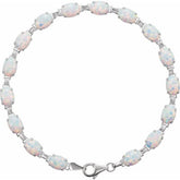 Oval Lab-Grown White Opal Line Bracelet In Gold & Platinum