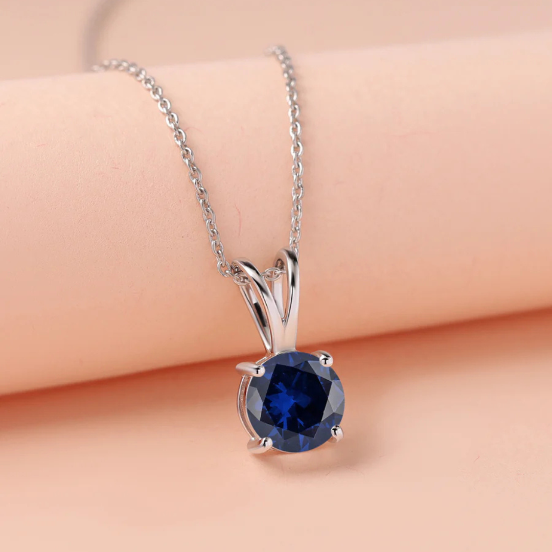 V-Bale Round Blue Sapphire Solitaire Pendant