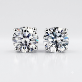 2ct-3ct round solitaire diamond stud earrings in gold.