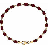 Oval Natural Mozambique Garnet Line Bracelet In Gold & Platinum