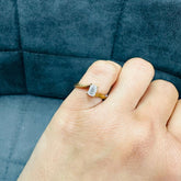 emerald cut bypass solitaire diamond ring