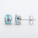 Natural Blue Oval Topaz Gemstone Studs Prong Set Earring in White Gold
