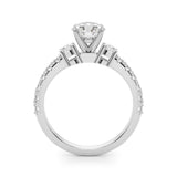 A diamond ring with a central gemstone and smaller stones