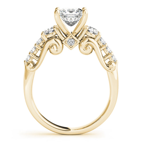 Gold ring with diamond accents on a white background
