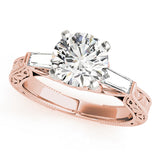 Rose gold ring with a large diamond on a white background
