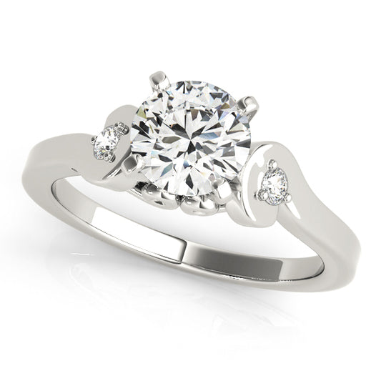 Diamond ring with two side stones on a white background