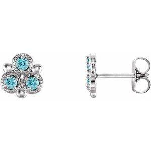 Blue Zircon Round Three-Stone Stud Earrings in Gold and Platinum