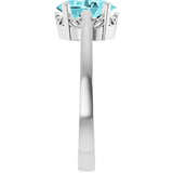 Oval Blue Zircon Solitaire Ring in Gold