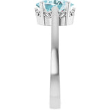 Oval Sky Blue Topaz Solitaire Ring in Gold