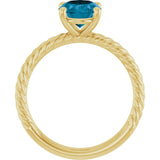 Oval London Blue Topaz Solitaire Ring in Gold