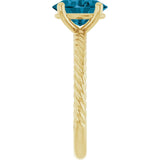 Oval London Blue Topaz Solitaire Ring in Gold