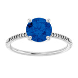 Round Lab-Grown Blue Sapphire Accented Ring in Gold