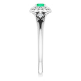 Round Emerald Halo Ring with Diamond Accents in Gold and Platinum