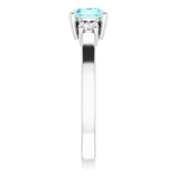 Round Blue Zircon Accented Ring with Diamond Accents in Gold