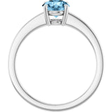 Round Sky Blue Topaz Solitaire Ring in Gold and Platinum