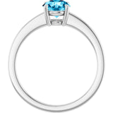 Round Aquamarine Solitaire Ring in Gold and Platinum