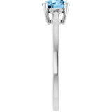 Round Sky Blue Topaz Solitaire Ring in Gold and Platinum