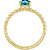 Round London Blue Topaz Solitaire Ring in Gold and Platinum