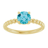 Round London Blue Topaz Solitaire Ring in Gold and Platinum