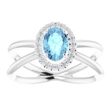 Oval Aquamarine Halo Ring with Diamond Accents in Gold and Platinum