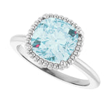 Cushion Sky Blue Topaz Solitaire Ring in Gold and Platinum